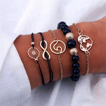 Load image into Gallery viewer, IPARAM Women's Vintage Multilayer Bracelet Set Bohemian Charm Heart Lotus Shell Bracelet Charm Geometric Crystal Beaded Fashion