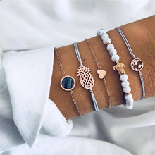 Load image into Gallery viewer, IPARAM Women's Vintage Multilayer Bracelet Set Bohemian Charm Heart Lotus Shell Bracelet Charm Geometric Crystal Beaded Fashion