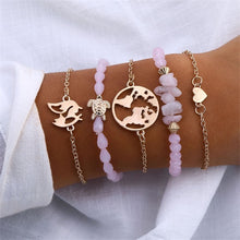 Load image into Gallery viewer, IPARAM Women's Vintage Multilayer Bracelet Set Bohemian Charm Heart Lotus Shell Bracelet Charm Geometric Crystal Beaded Fashion